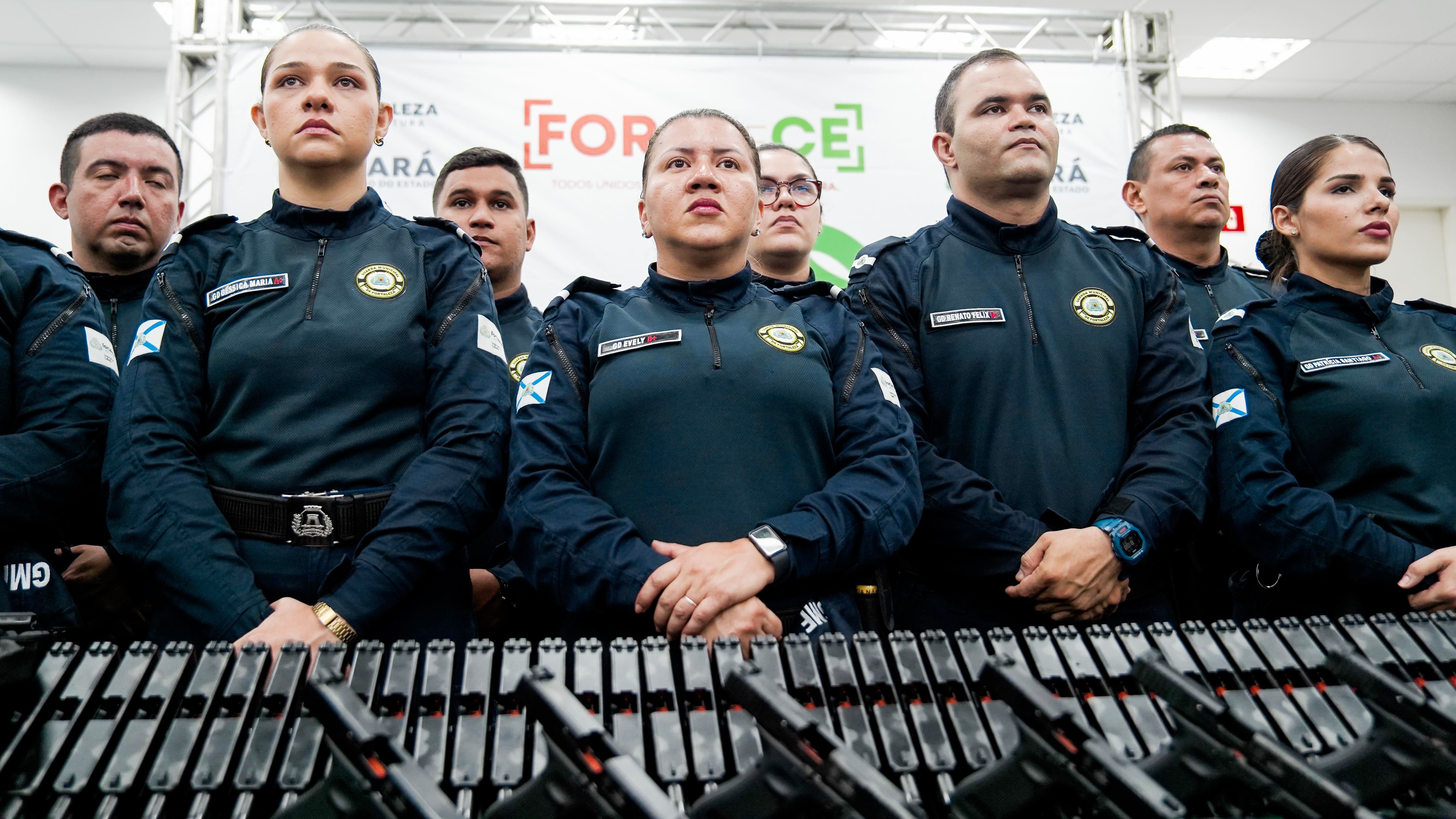 grupo de guardar municipais durante o evento